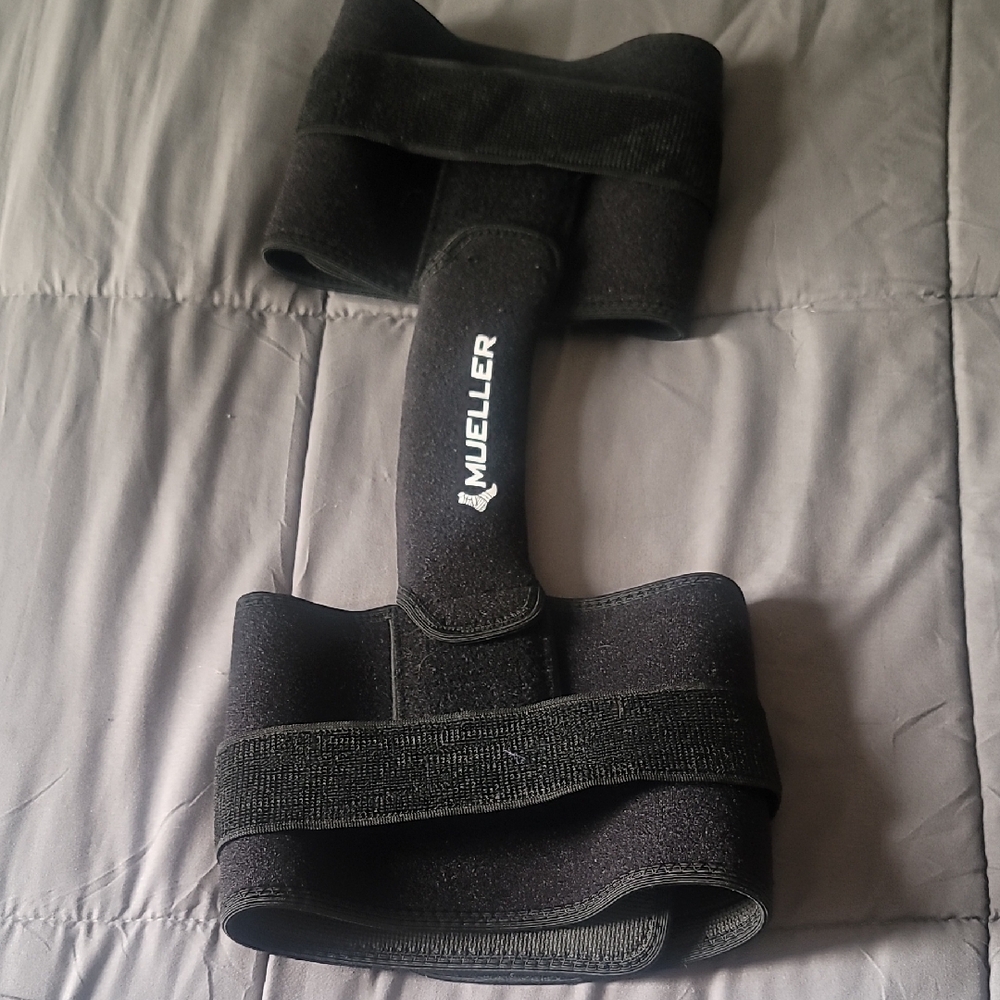 Black Supportive Knee Brace with Adjustable Velcro Straps